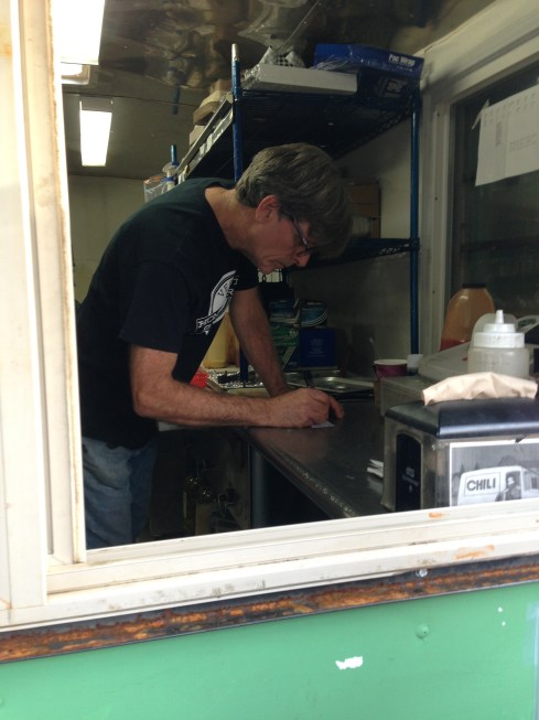 Ed Begley Jr -- I mean Phil Lesh -- inside his Homegrown Smoker food cart.